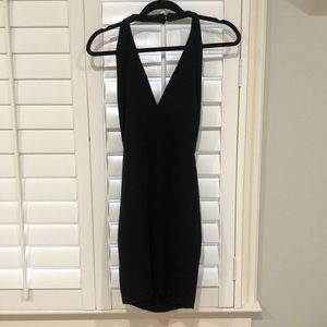 Open back black cocktail dress